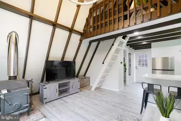 view of living room with furniture and flat screen tv