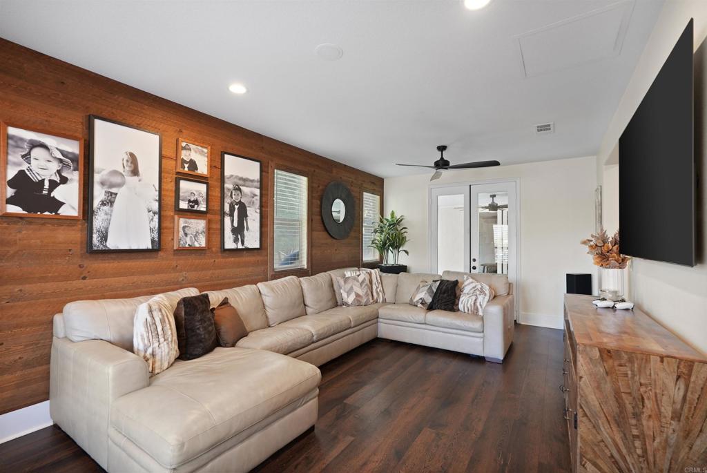 25351 Forest Street Corona, CA 92883 - Photo 13 of 72 a living room with furniture and a flat screen tv