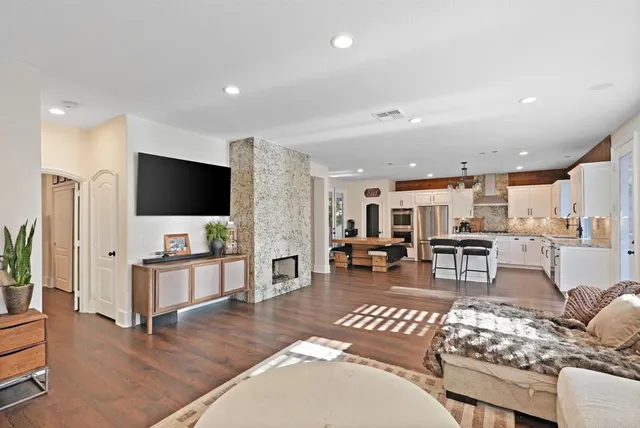 a view of a hallway with paintings on the wall