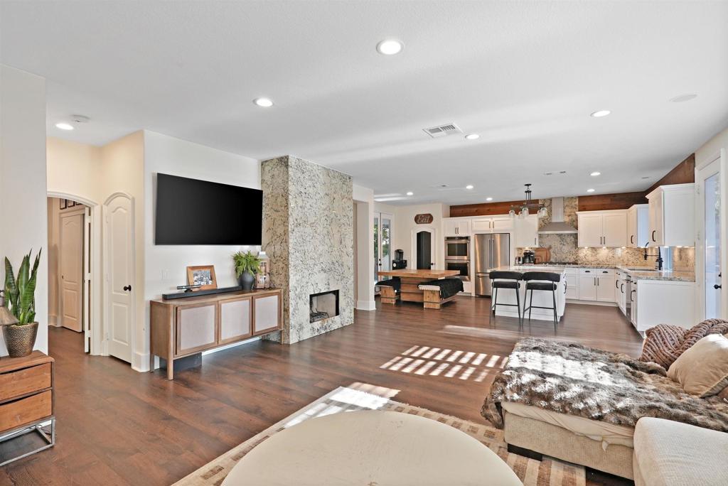 25351 Forest Street Corona, CA 92883 - Photo 14 of 72 a living room with furniture and a flat screen tv