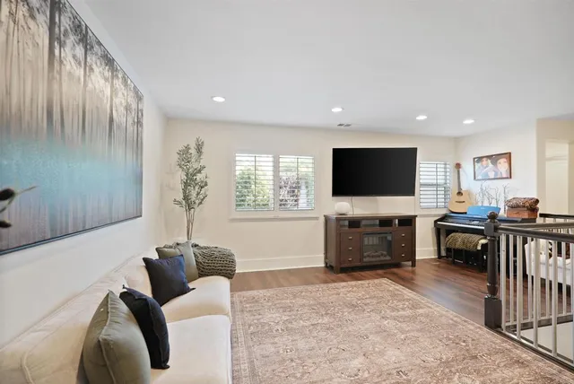 a living room with furniture and a couch