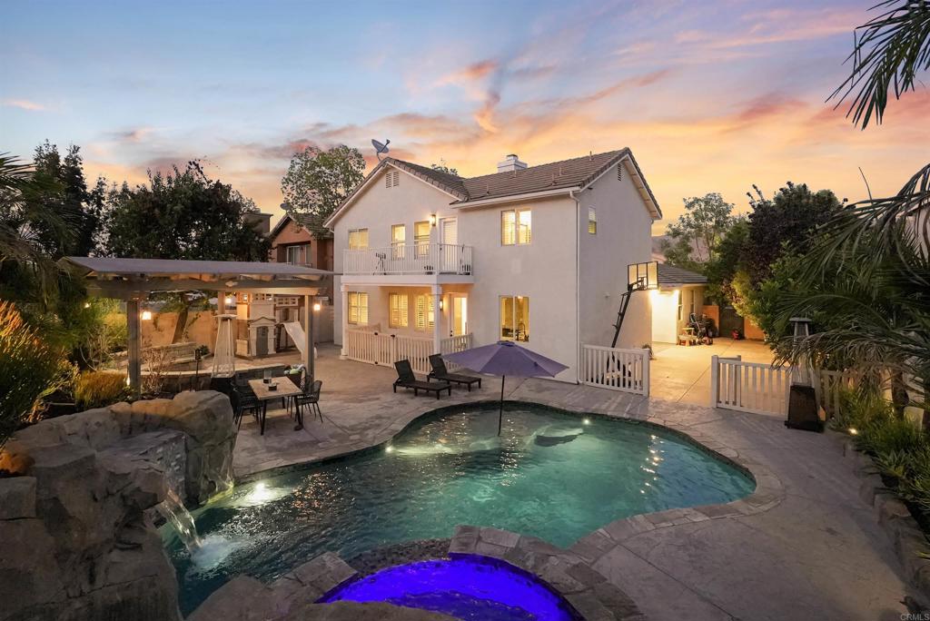 25351 Forest Street Corona, CA 92883 - Photo 2 of 72 a view of a house with swimming pool and sitting area