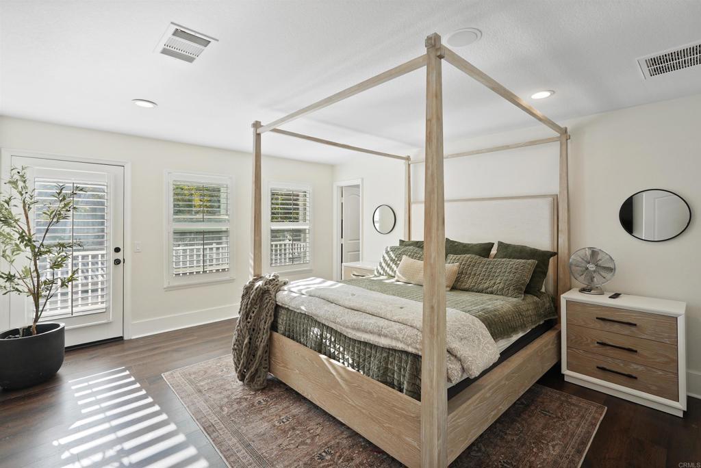 25351 Forest Street Corona, CA 92883 - Photo 28 of 72 a bedroom with a bed lamp closet and large window