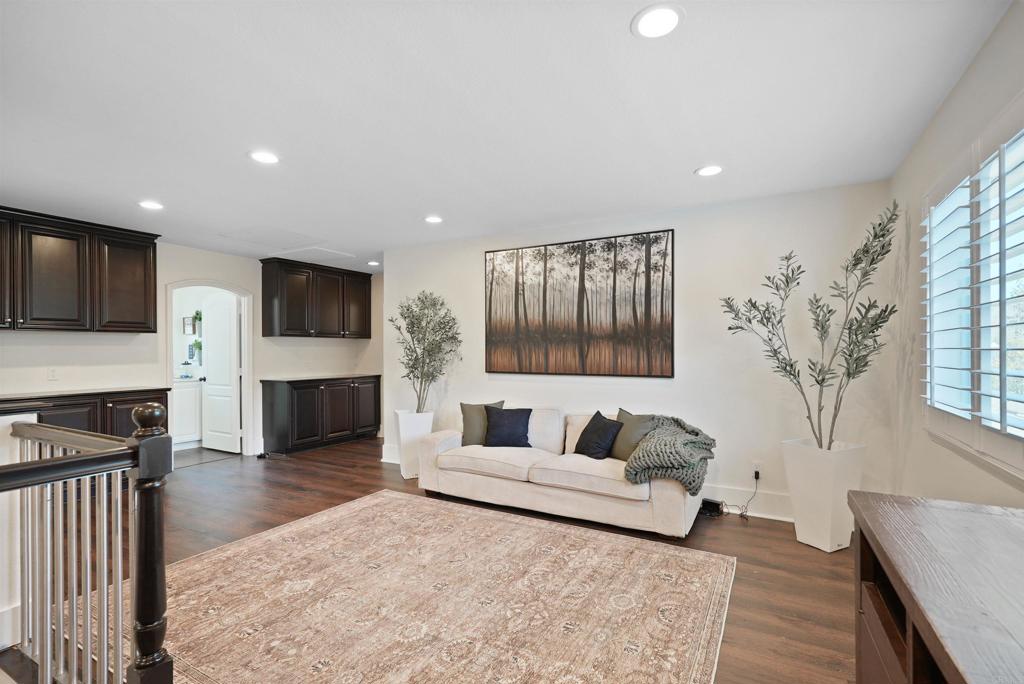 25351 Forest Street Corona, CA 92883 - Photo 3 of 72 a living room with furniture and a flat screen tv