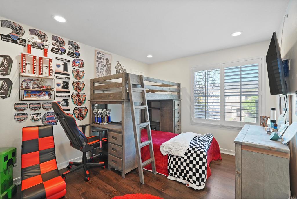 25351 Forest Street Corona, CA 92883 - Photo 34 of 72 a living room with furniture and a flat screen tv