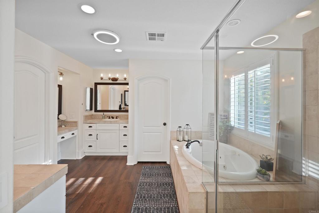 25351 Forest Street Corona, CA 92883 - Photo 41 of 72 a bathroom with a bathtub sink and mirror