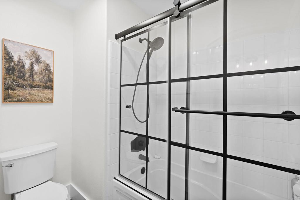 25351 Forest Street Corona, CA 92883 - Photo 42 of 72 a bathroom with a shower a toilet and a window