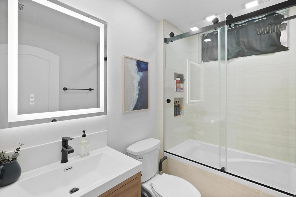 25351 Forest Street Corona, CA 92883 - Photo 45 of 72 a bathroom with a sink toilet and shower