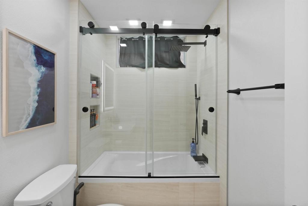 25351 Forest Street Corona, CA 92883 - Photo 46 of 72 a bathroom with a shower and toilet