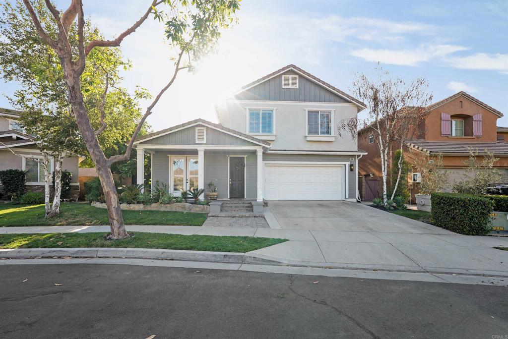 25351 Forest Street Corona, CA 92883 - Photo 67 of 72 a front view of a house with a garden and trees