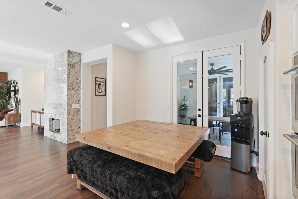 25351 Forest Street Corona, CA 92883 - Photo 7 of 72 a living room with a bed and wooden floor