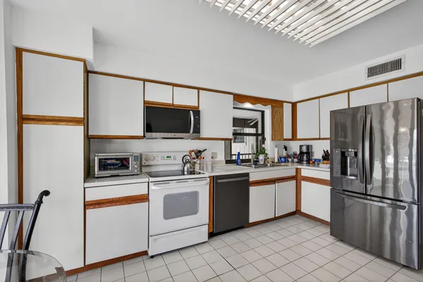 $540,000 | 16942 Waterbend Drive, Unit 258, Jupiter, FL 33477