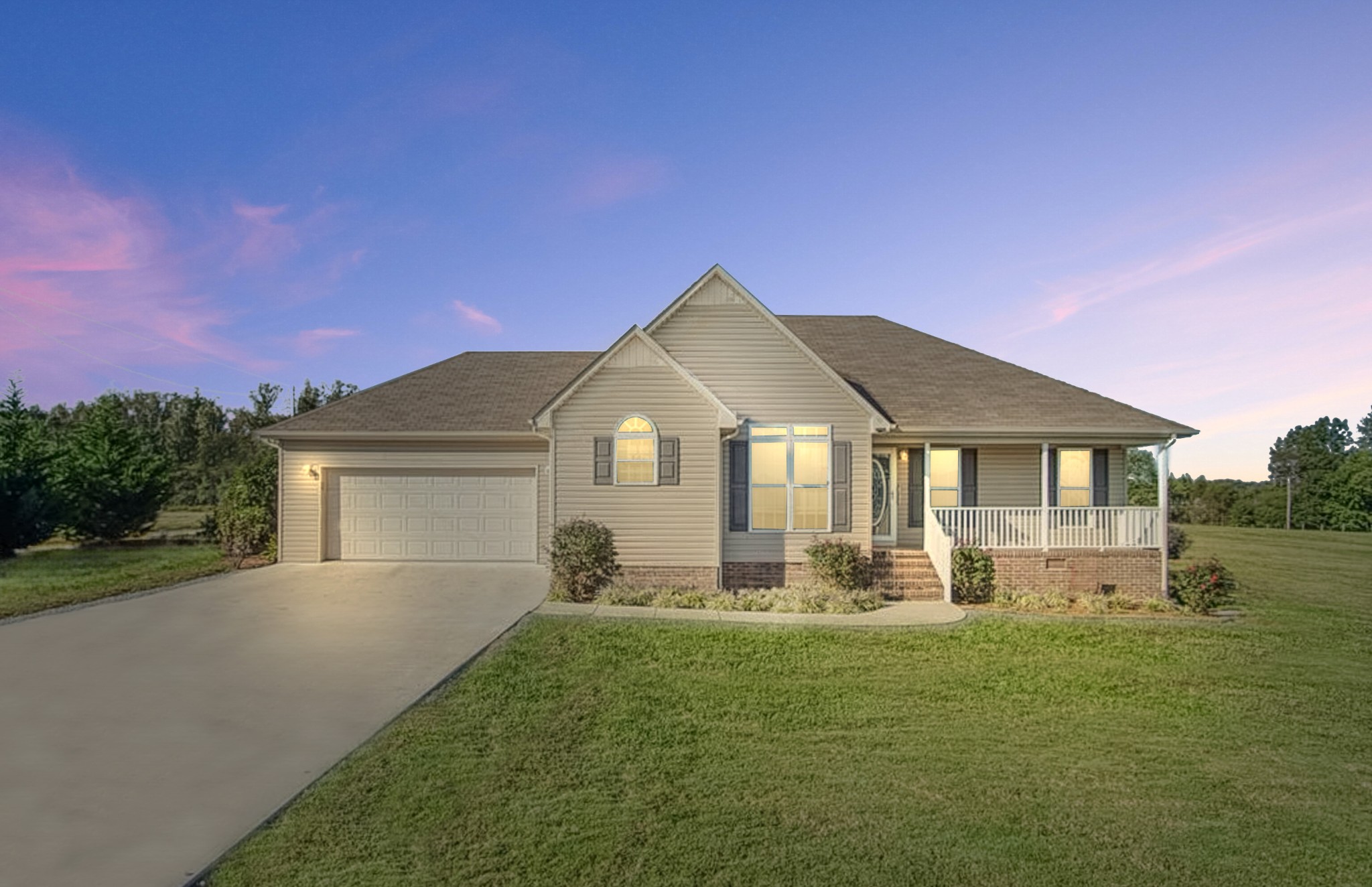 185 Patrick Road Fayetteville, TN 37334 - Photo 1 of 28 a front view of a house with a yard