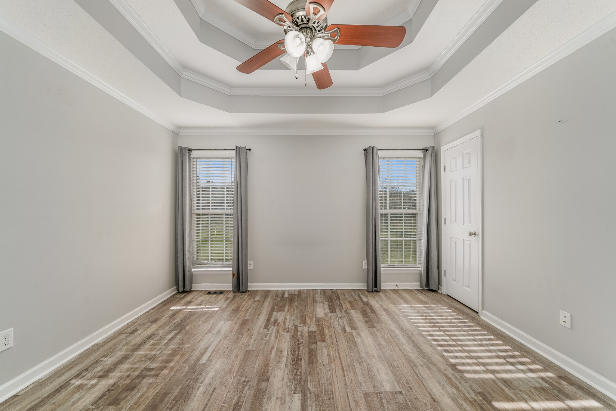 185 Patrick Road Fayetteville, TN 37334 - Photo 13 of 28 wooden floor in an empty room with a window