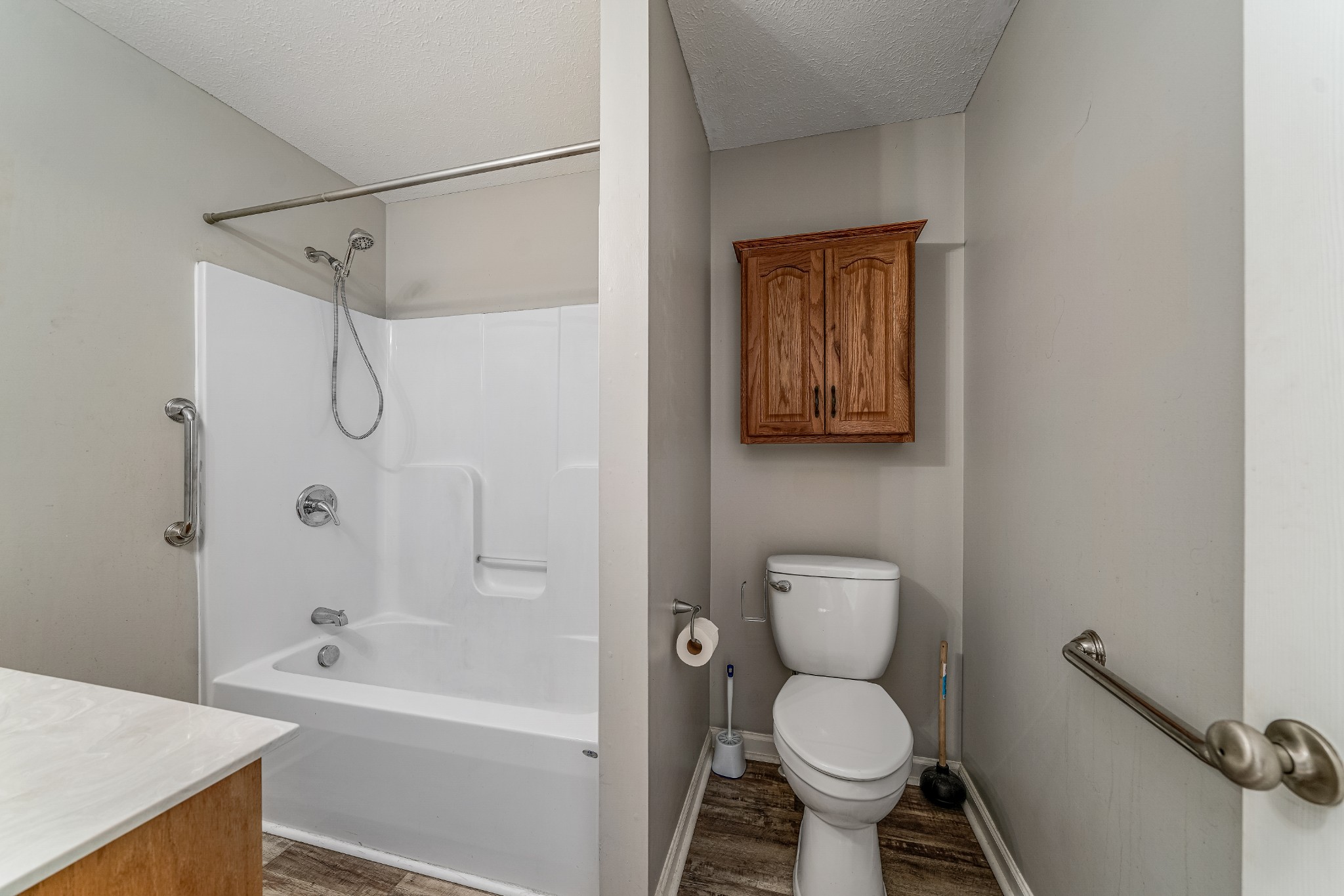 185 Patrick Road Fayetteville, TN 37334 - Photo 17 of 28 a bathroom with a toilet sink and shower