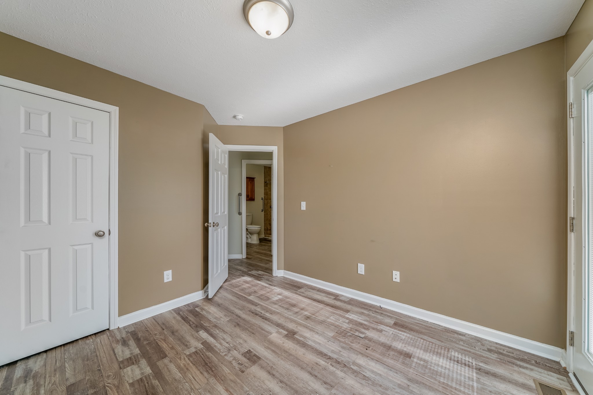 185 Patrick Road Fayetteville, TN 37334 - Photo 19 of 28 a view of an empty room and window
