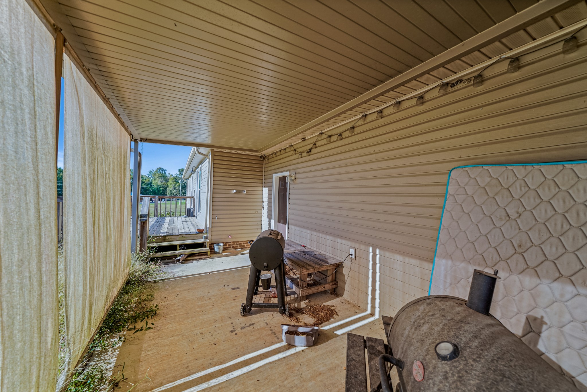 185 Patrick Road Fayetteville, TN 37334 - Photo 23 of 28 a balcony view with a glass door and glass door