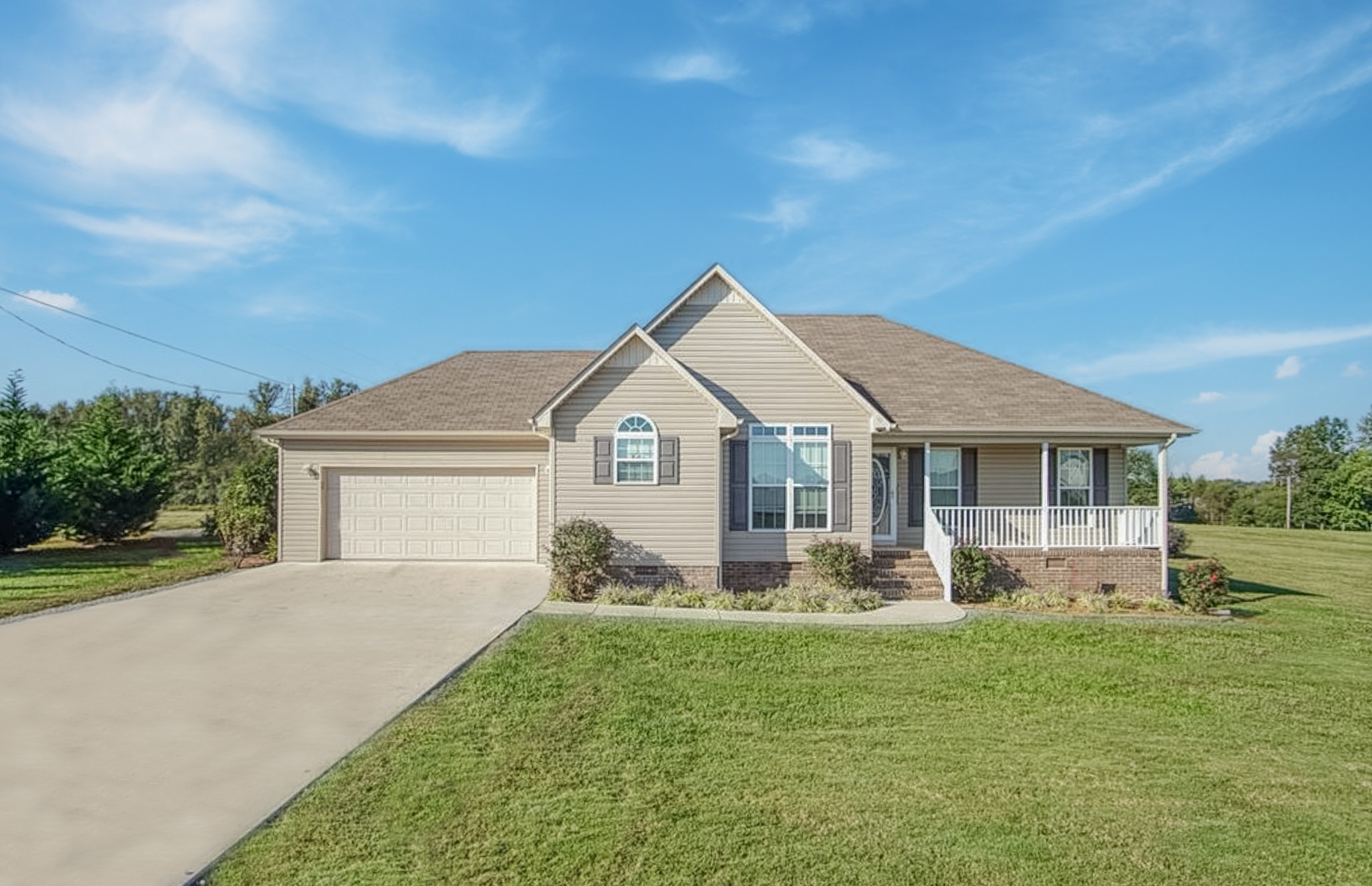 185 Patrick Road Fayetteville, TN 37334 - Photo 28 of 28 a front view of a house with garden