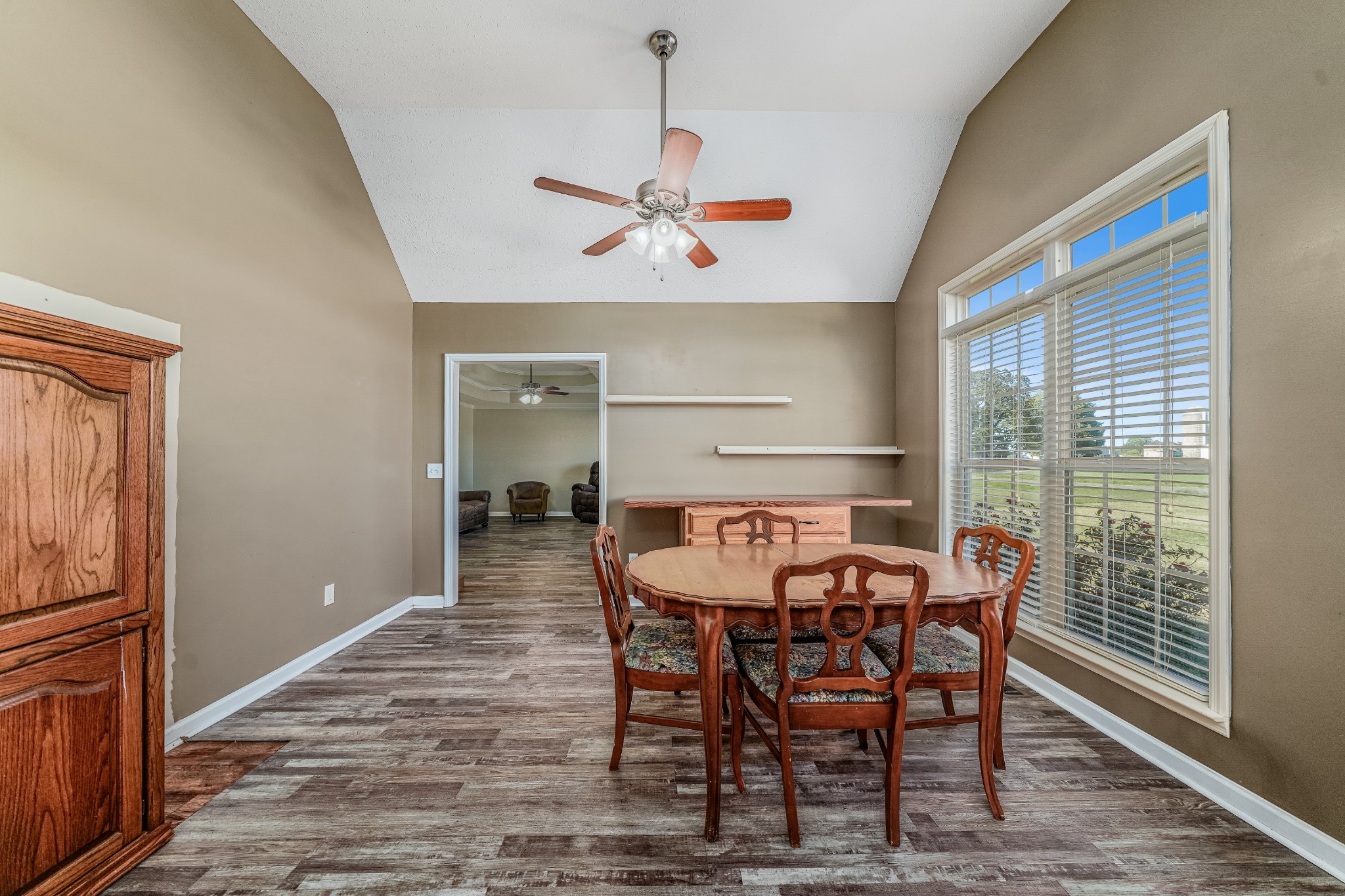 185 Patrick Road Fayetteville, TN 37334 - Photo 8 of 28 a view of a dining room with furniture window and wooden floor