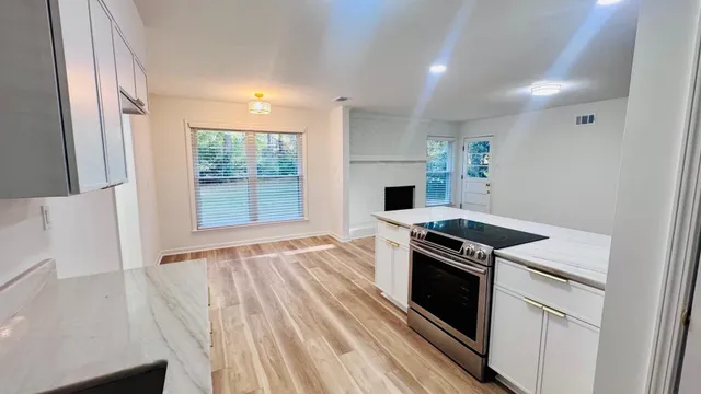 a kitchen with a sink and cabinets