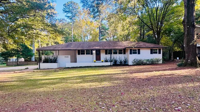 a front view of a house with swimming pool