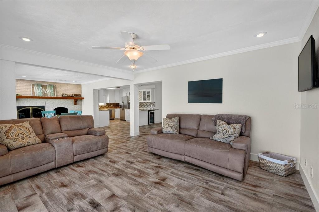 450 Lambert Avenue Flagler Beach, FL 32136 - Photo 26 of 41 a living room with furniture and a wooden floor