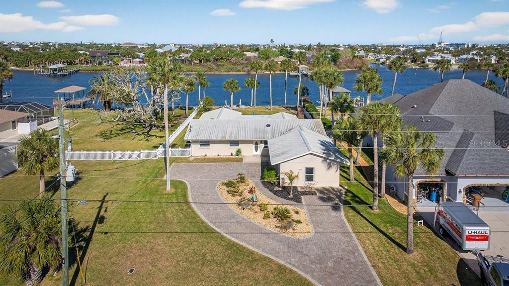 450 Lambert Avenue Flagler Beach, FL 32136 - Photo 36 of 41 a view of a city with lawn chairs