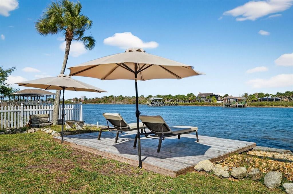 450 Lambert Avenue Flagler Beach, FL 32136 - Photo 4 of 41 a lake view with a seating space