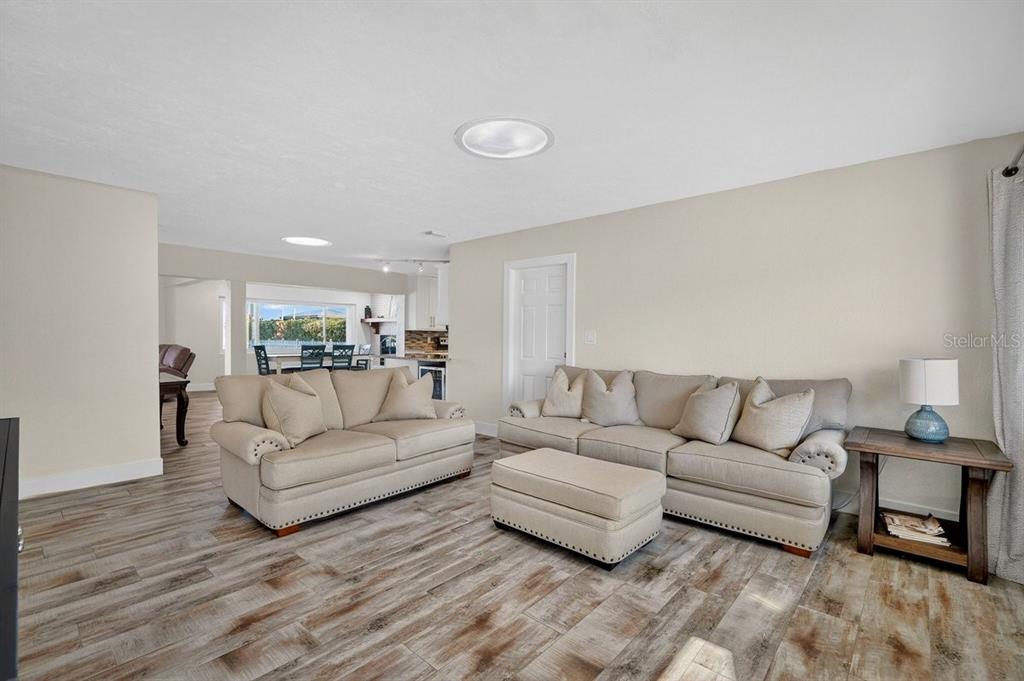 450 Lambert Avenue Flagler Beach, FL 32136 - Photo 5 of 41 a living room with furniture and a couch
