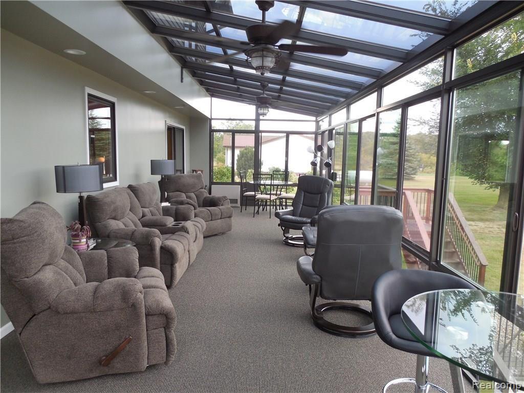 3955 Innisfree Road Howell, MI 48855 - Photo 3 of 43 Will this 4 season sun room be your favorite room?