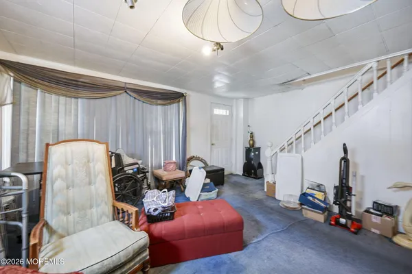 a room with furniture and a chandelier