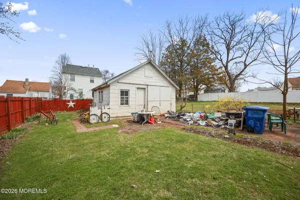 a view of a small yard in front of a house