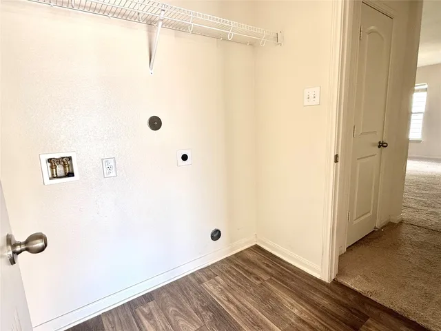 a view of pool with wooden fence