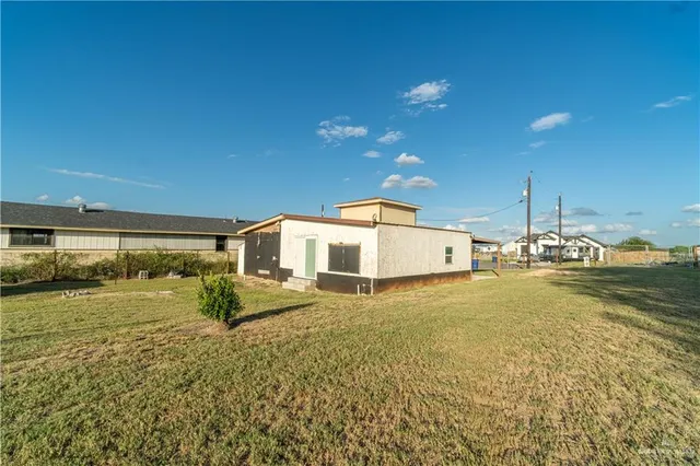 a big room with yard and garage