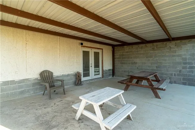 a building outdoor space with patio furniture