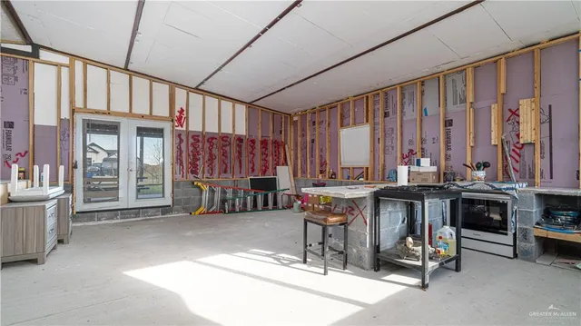 a table and chairs sitting in a room