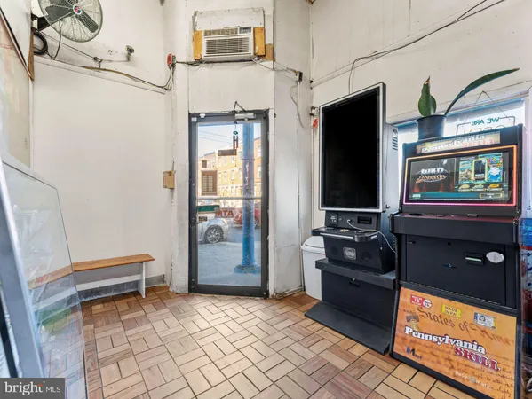 a kitchen with stainless steel appliances a refrigerator and a stove