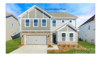 308 Streamwood Road Troutman, NC 28166 - Photo 1 of 39 a front view of a house with a yard