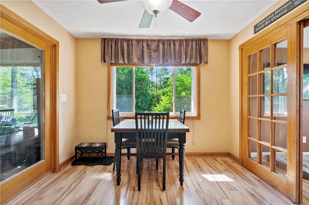 839 West Old Rte 422 Butler, PA 16001 - Photo 12 of 30 a view of a dining room with furniture window and wooden floor