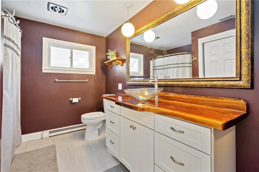 839 West Old Rte 422 Butler, PA 16001 - Photo 15 of 30 a bathroom with a granite countertop sink mirror vanity and toilet