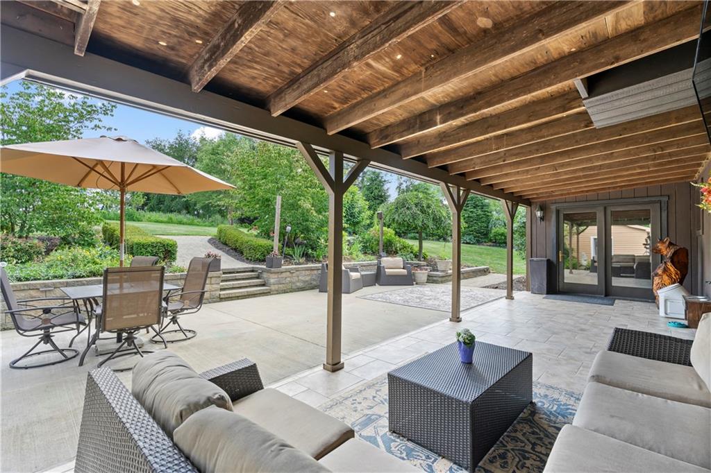 839 West Old Rte 422 Butler, PA 16001 - Photo 24 of 30 a outdoor space with patio the couches and pool with a patio