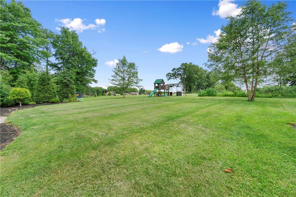 839 West Old Rte 422 Butler, PA 16001 - Photo 26 of 30 a view of a green field with trees in the background