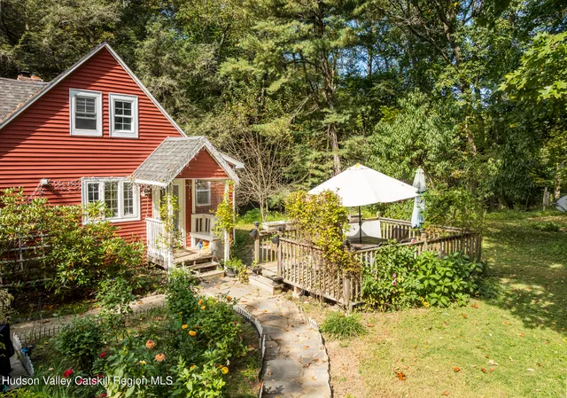a fire hydrant in the middle of a yard