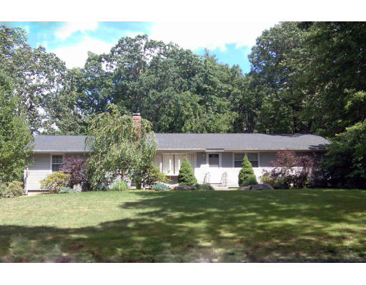 25 Stone School Road Sutton, MA 01590 - Photo 1 of 1 a front view of a house with a garden