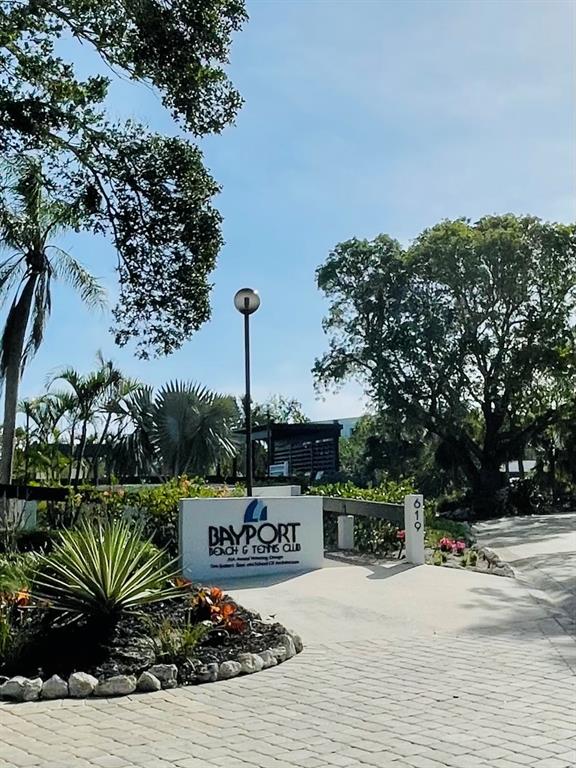 618 Bayport Way, Unit 618 Longboat Key, FL 34228 - Photo 29 of 47 a park view with a bench