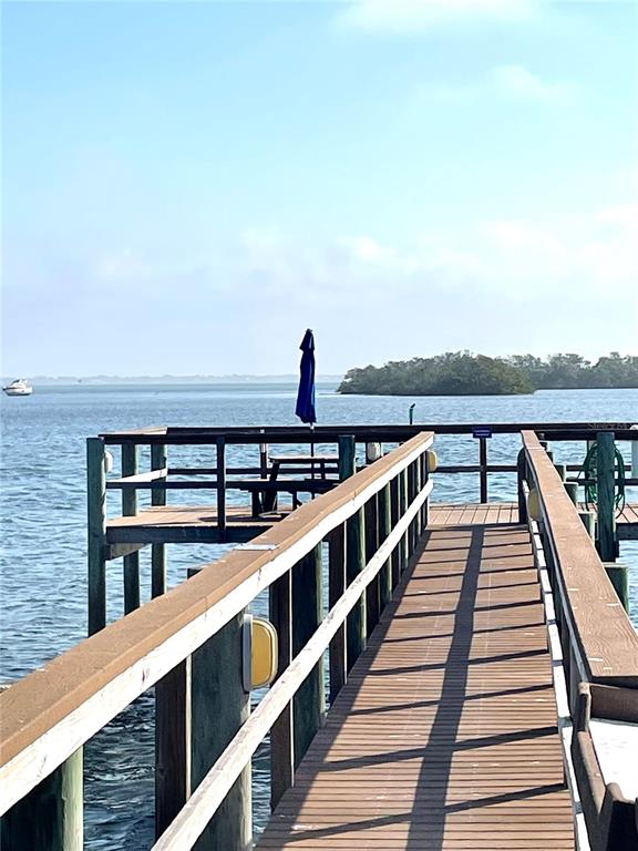 618 Bayport Way, Unit 618 Longboat Key, FL 34228 - Photo 32 of 47 a view of balcony and deck