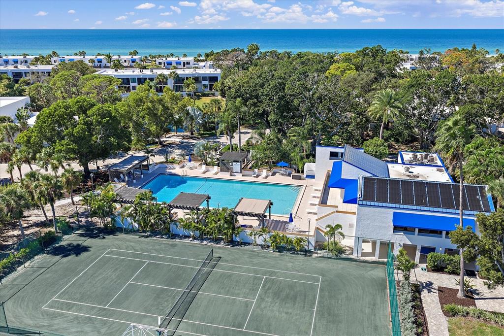 618 Bayport Way, Unit 618 Longboat Key, FL 34228 - Photo 36 of 47 a view of a swimming pool and outside seating area