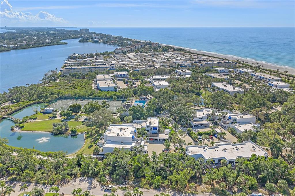 618 Bayport Way, Unit 618 Longboat Key, FL 34228 - Photo 4 of 47 an aerial view of residential building and lake