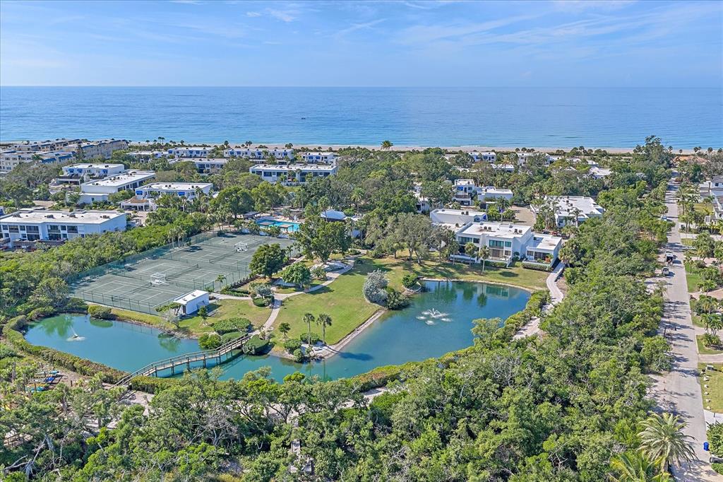 618 Bayport Way, Unit 618 Longboat Key, FL 34228 - Photo 42 of 47 an aerial view of residential houses with outdoor space and trees