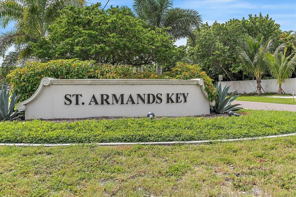 618 Bayport Way, Unit 618 Longboat Key, FL 34228 - Photo 46 of 47 a view of outdoor space with sign board and garden